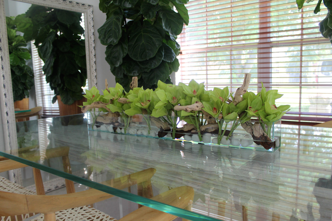 36″ Casa Moderna glass plate planter with green Cymbidium orchids