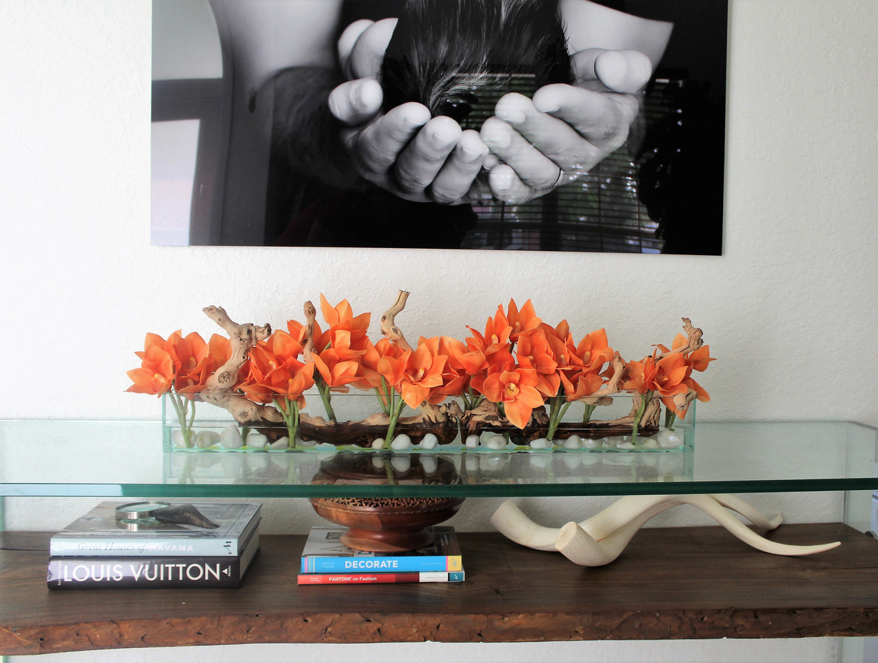 36″ Casa Moderna glass plate planter with orange Cymbidium orchids